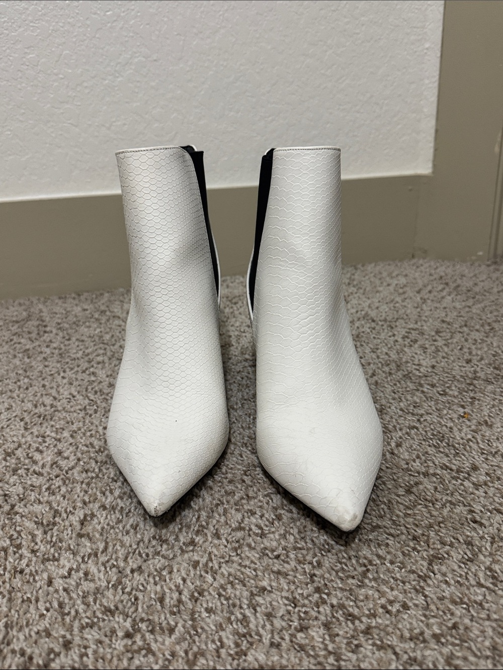 Kittenish White Pointed Toe Ankle Boots